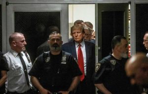 The shocking arraignment and perp walk of former President Donald Trump. He would go on to plead not guilty to 34 counts of falsifying business records in his court appearance in New York. (April 4, 2023.)